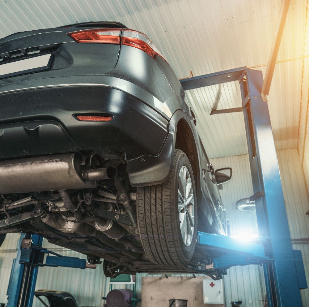 Vehicle on an mot ramp - MOT Killingworth | Westmoor MOT Centre